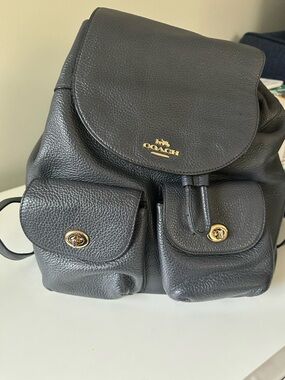 Coach Black Pebbled Leather Drawstring Backpack with Gold Accents